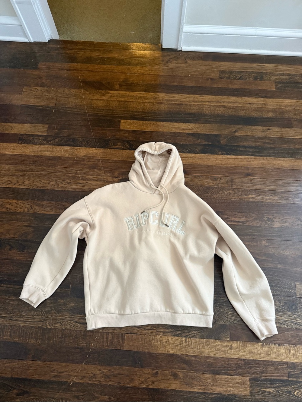 Hooded sweatshirt likely a sweater